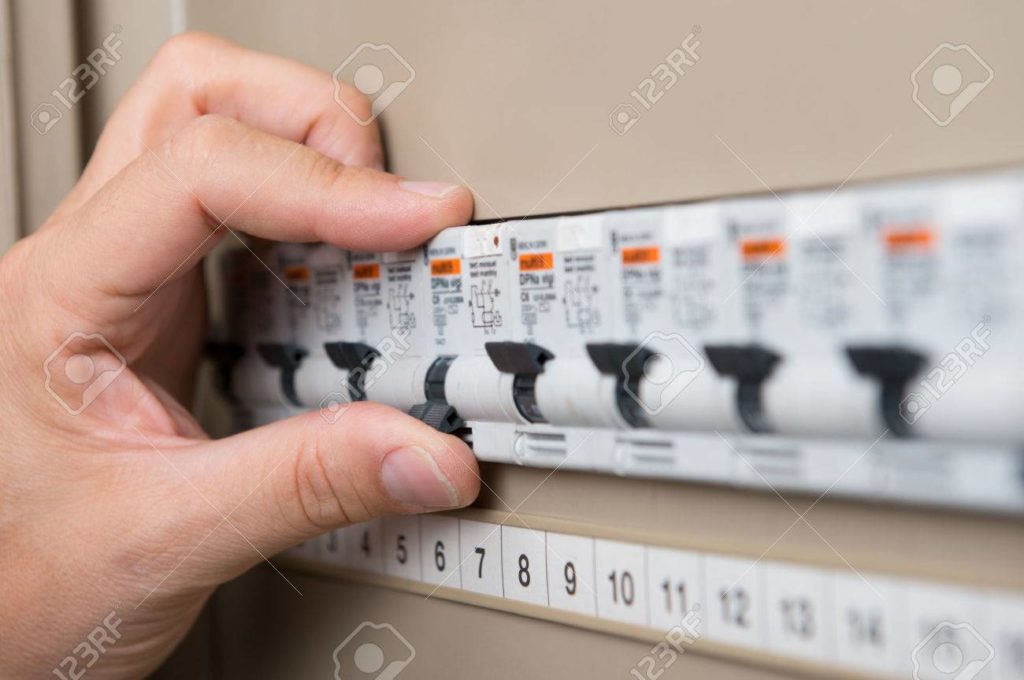 33251271-closeup-of-person-s-hand-repair-the-switchboard